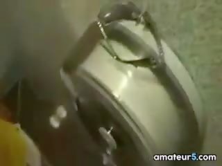 Housewife In A Public Washroom Swallows