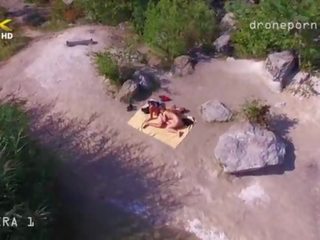 Desnuda playa sexo, voyeurs vídeo tomado por un drone