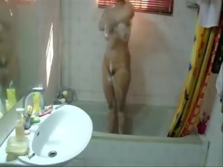 A ayu big boobed slim prawan is taking a bath in