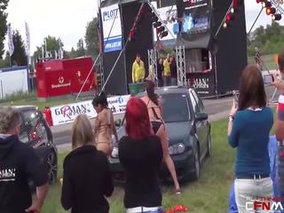 Sexy Russian models tag team wash & arouse guy at a car show