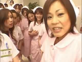 Asiática enfermeras disfruta sexo en superior