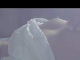 Dark haired fingering her sleepy Pussy