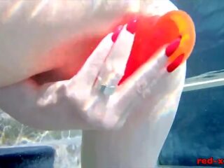 Busty redhead wife masturbates while outside in the pool Porn Videos