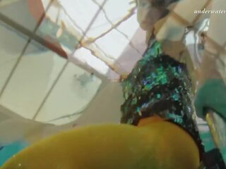 Swimming pool erotics in cute fishnets