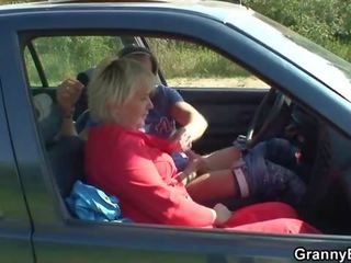 Old bitch gives head in the car then doggystyled